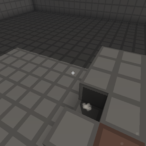 First-person view of a voxel floor with a block broken out of it and debris particles